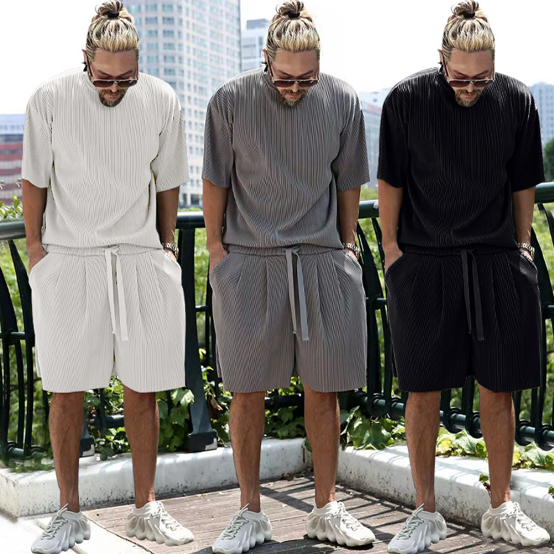 2022 estación independiente de verano europeo y americano rayas verticales de los hombres traje suelto pantalones cortos de manga corta de color sólido traje deportivo casual