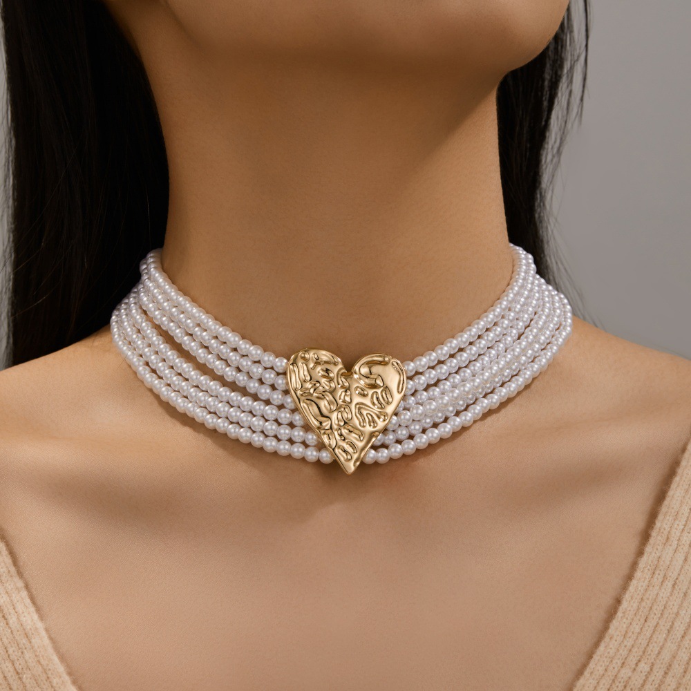 sophisticated golden three dimensional necklace from pearl