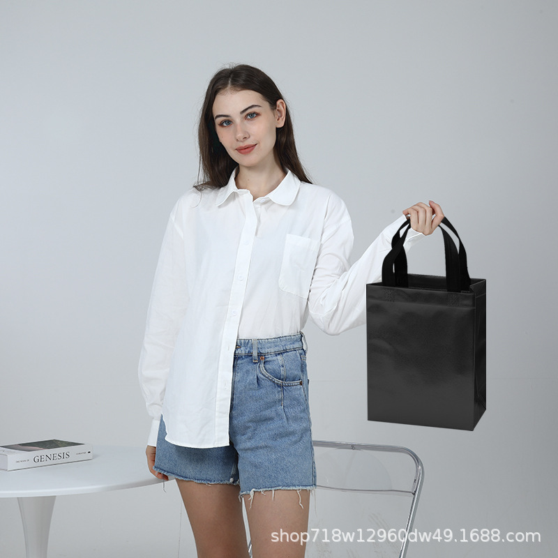 En stock nueva bolsa de regalo no tejida láser bolsa de regalo de boda bolsa de fiesta de comercio exterior logotipo imprimible