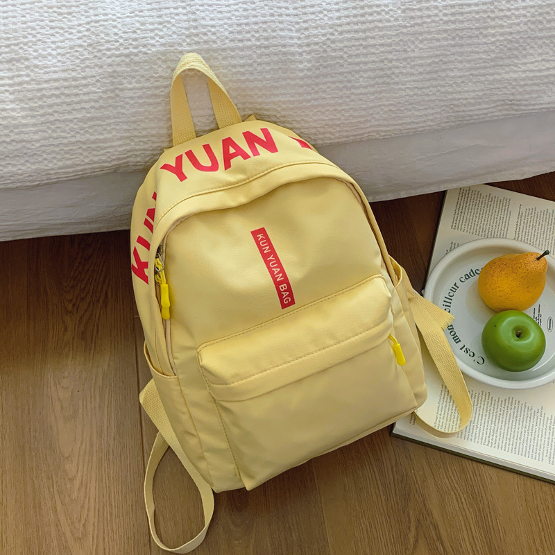 Mochila INS de estilo japonés para niñas, estudiantes de secundaria, mini mochila simple y versátil, mochila pequeña ligera para salidas de primavera, informal.