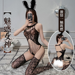 Sexy women's lingerie: strappy, sexy open-crotch bodysuit with mesh fabric, silk stockings, jacquard patterned open-crotch design exposing the breasts.