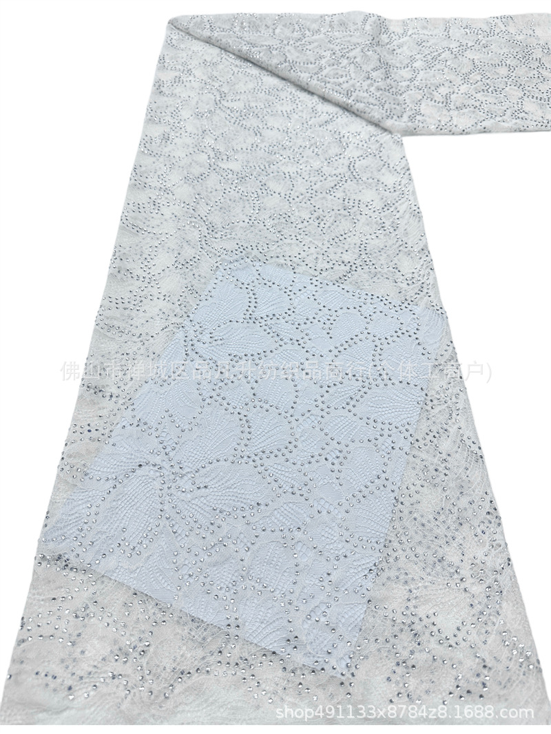 Nuevo hueco flor de encaje fondo tela de perforación caliente pesada cola de pez vestido de boda vestido de noche brindis tela spot