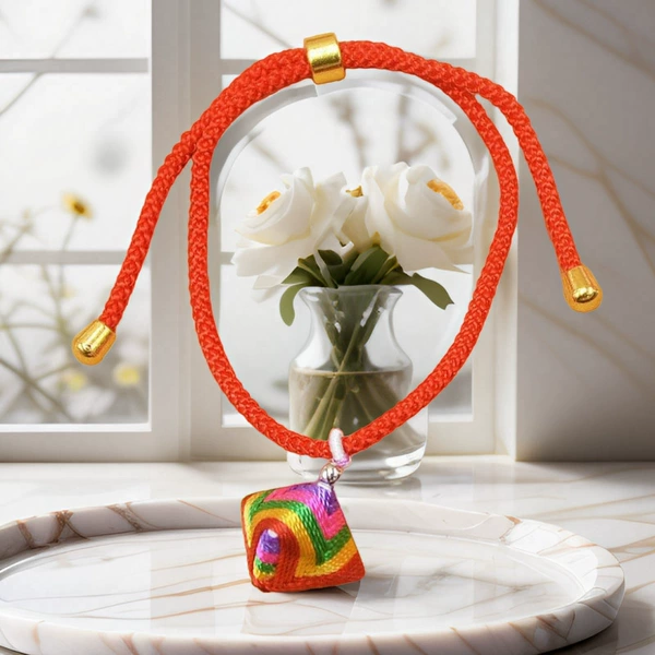 Red, rope, silk, rice dumplings (1 piece)