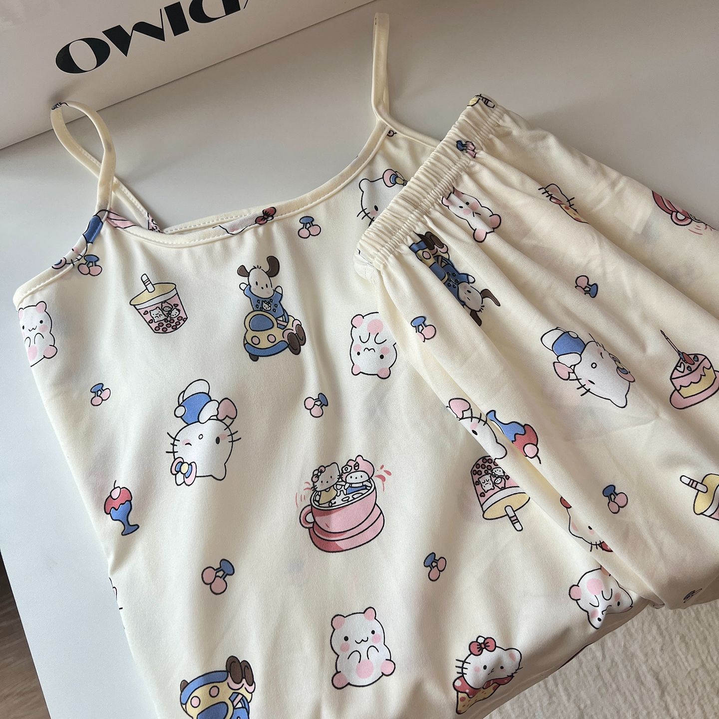 Pijamas transfronterizos al por mayor con almohadillas para el pecho para mujeres verano nuevos pantalones cortos de honda de dibujos animados coreanos lindo traje de servicio a domicilio imitación algodón