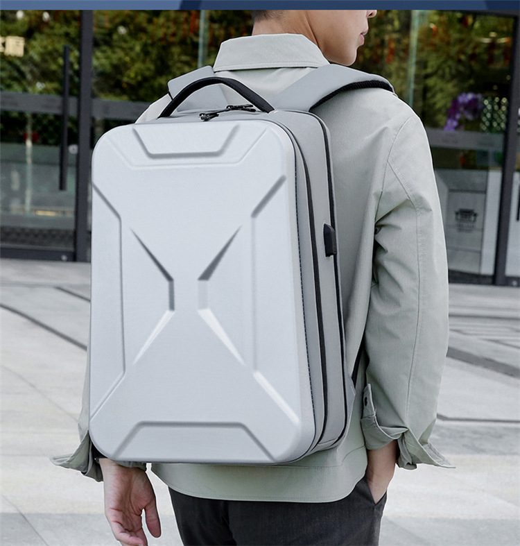 A new cross-border hard-shell business backpack with large capacity and multiple functions, a 17-inch computer bag for commuting and business trips, and a high-end feel on both shoulders undefined