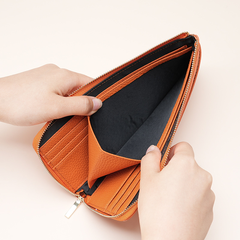 アマゾンの本革の女性の財布の長いタイプのRFIDの盗難防止のブラシの牛革の硬貨の0財布の多いカードの位置の手は財布の女性を持ちます。