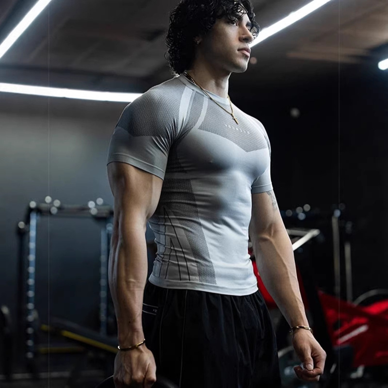 New Fitness Clothing Coach Sports T-Shirt Tights Men's High-Elastic Training Clothes Short-Sleeved Fitness Clothing New Fitness Clothing Coach Sports T-Shirt Tights Men's High-Elastic Training Clothes Short-Sleeved Fitness Clothing