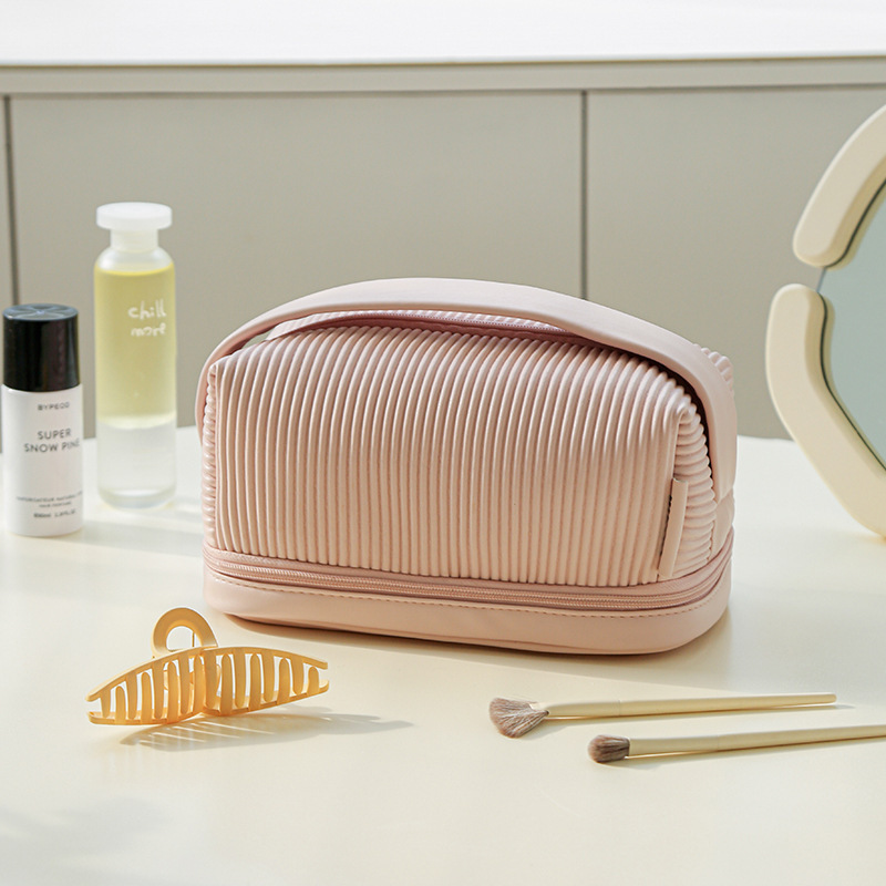 2022 new portable cosmetic bag ins style leather high-end cream toast handbag storage bag wholesale