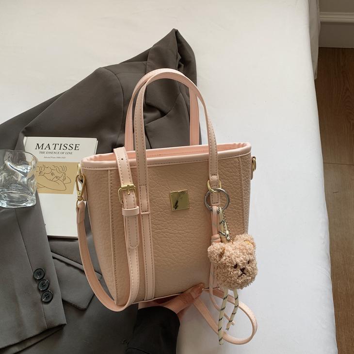 Bolsa de cubo de mano de comercio exterior para mujeres 2025 nuevo nicho de diseño exterior bolso de hombro de estilo universal bolso de mochila de moda casual