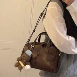 南枫新款经典伯恩邮报枕头包2025超火通勤包包女手提包单肩斜挎包