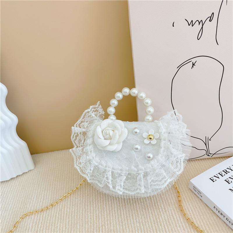 2022 nuevas niñas bolso de perlas de dibujos animados lindo arco princesa bolso de hombro estilo occidental encaje pequeño bolso de hombro