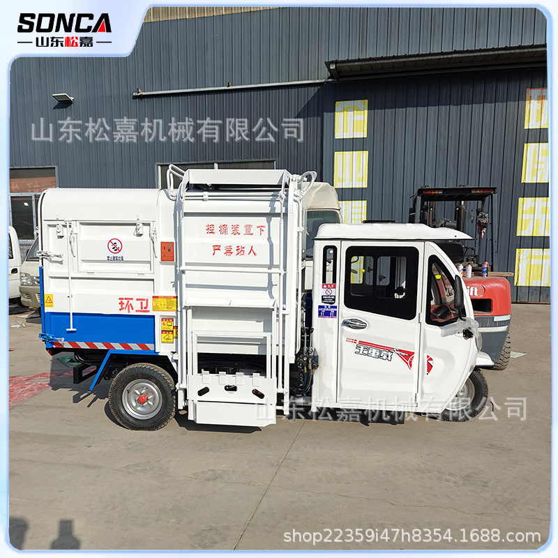 Vehículo de limpieza de basura de 4 toneladas de autocarga y descarga de propiedad de la comunidad de descarga de basura eléctrica de cuatro ruedas