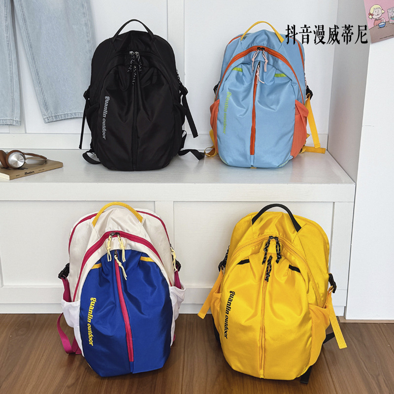 Shake Marvel Tini gran capacidad 2025 nuevo color al aire libre montañismo mochila de viaje casual mochila para hombres y mujeres