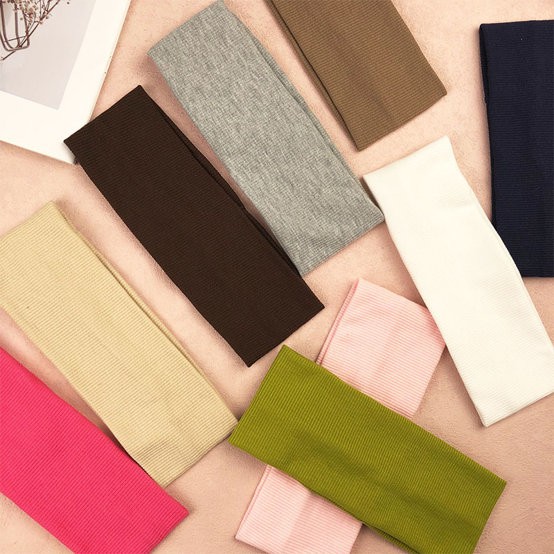 Primavera y verano nueva celebridad de Internet tejido de color sólido de ala ancha diadema elástica yoga deportes moda temperamento versátil tocado exterior