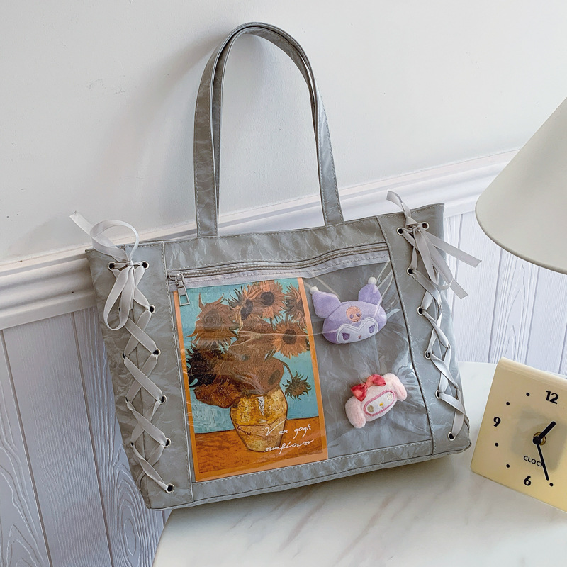 Bolsa de gran capacidad para mujeres dulces niñas de dos dimensiones transparentes 2025 primavera y verano pequeñas bolsas de hombro bajo la axila fresca
