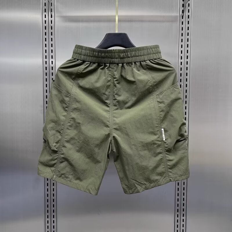 Verano americano, pantalones cortos de bolsillo verde, pantalones casuales para hombres, pantalones de playa, pantalones de pelo