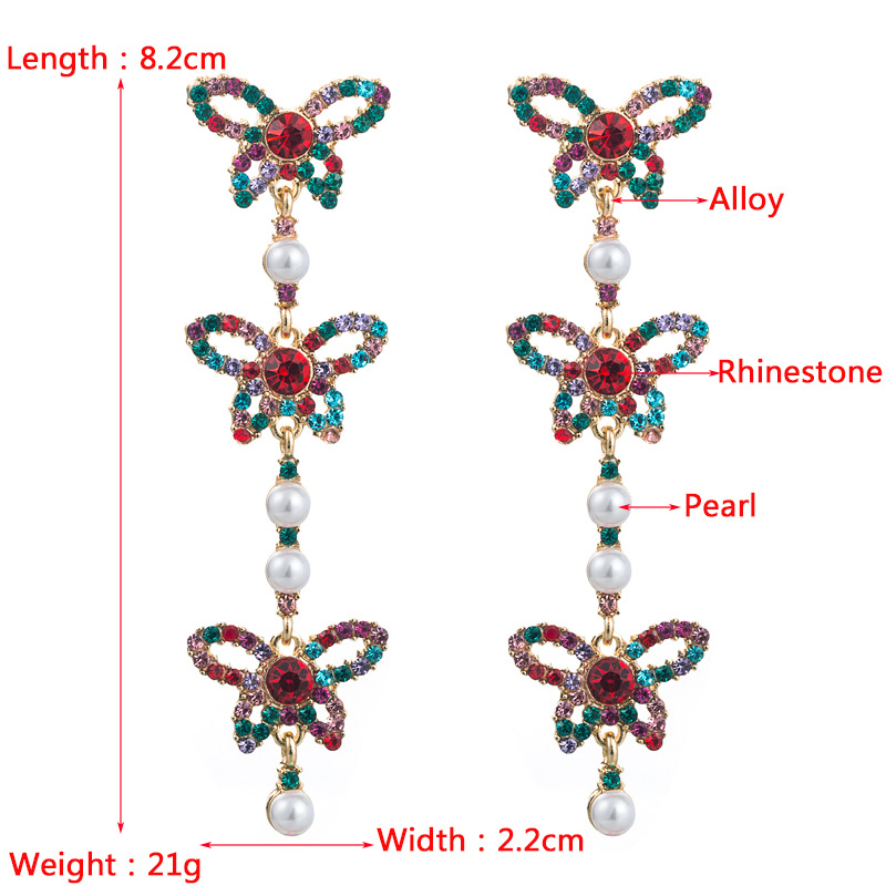 Fashion Rhinestone Butterfly Long Pearl Alloy Earrings Wholesale display picture 1