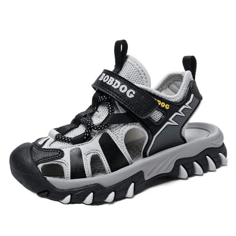 Sandalias Babudou para niño Baotou Summer 2025 nuevos niños de mediana edad zapatos de playa para niños antideslizantes de suela blanda