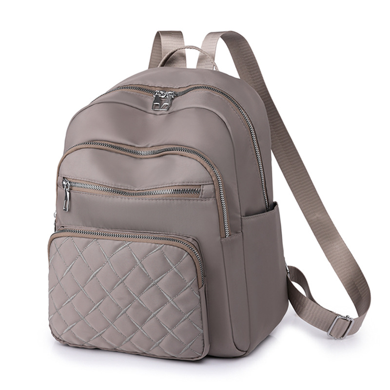2025 nueva mochila de nylon impermeable transfronteriza mochila de damas de transporte urbano de gran capacidad de moda mochila de estudiantes