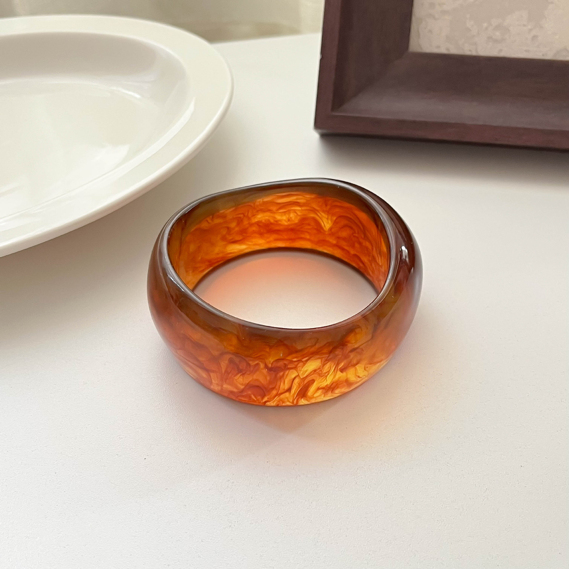 Red amber (inner diameter 66.8 weight 67.2 grams)