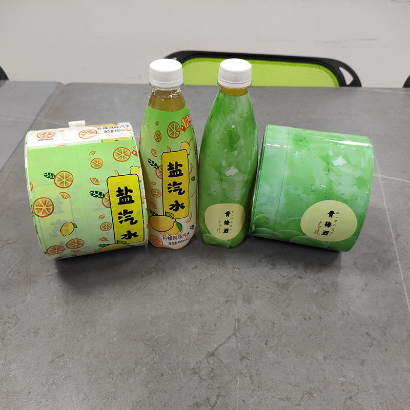 Película de etiqueta de impresión Película Termocontraíble Impresión en color Botella de vino de bebidas Película de etiqueta Proteína en polvo Embalaje de plástico Película de sellado Rollo de película