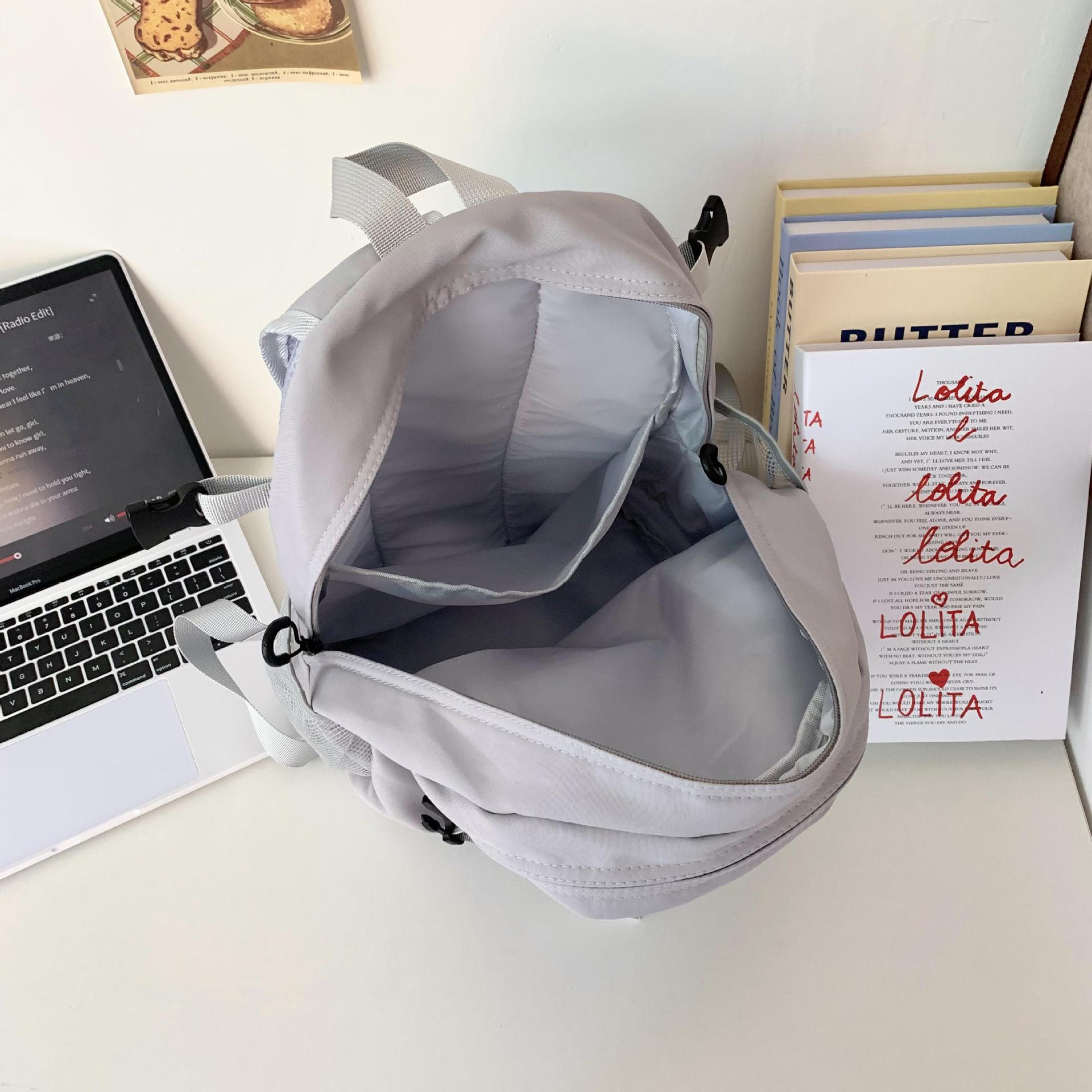 Mochila 2024 nueva mochila ligera para la escuela secundaria y secundaria, bolsa de viaje de gran capacidad, bolso femenino de cercanías, mochila para estudiantes universitarios, hombre