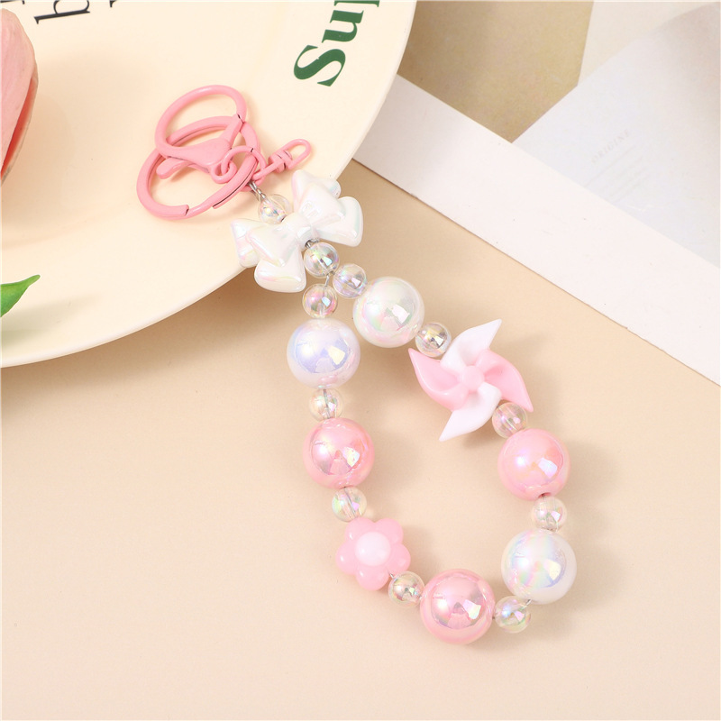 Japón y Corea del Sur color ins hecho a mano con cuentas flor llavero cordón de muñeca macaron color pétalo cordón de teléfono móvil en stock