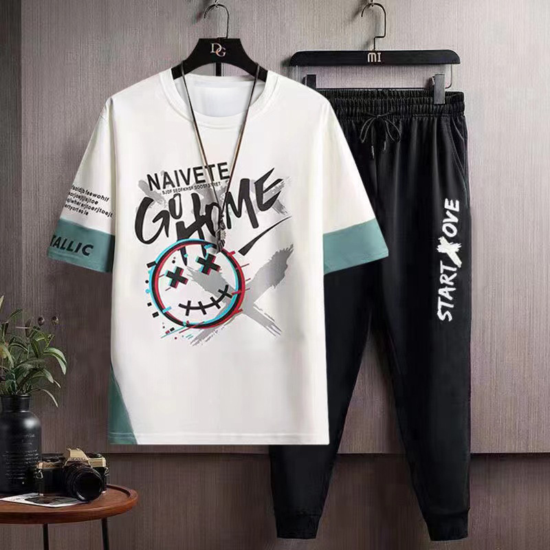 Hip hop Camiseta de manga corta de los hombres de verano de Hong Kong estilo media manga INS de moda todo fósforo camiseta casual pantalones cortos deportivos traje de dos piezas