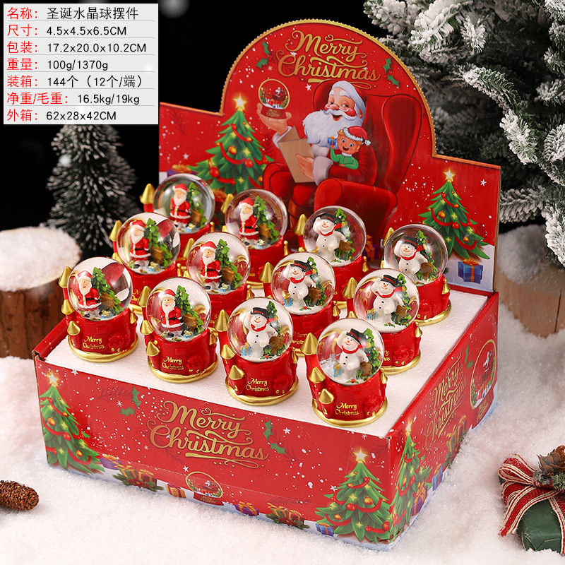 Una variedad de regalos de decoración de Navidad Navidad iluminante bola de cristal caja de música ventana diseño de velas lámparas de viento árbol de Navidad