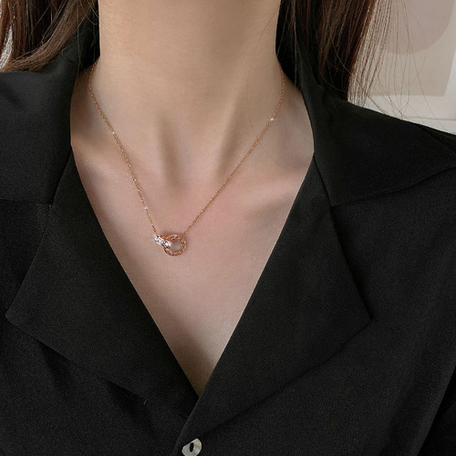 Titanium steel necklace for women, Korean-style, with Roman numeral double-ring pendant—trendy Instagram-inspired diamond-studded clavicle chain featuring a uniquely designed statement neckpiece.
