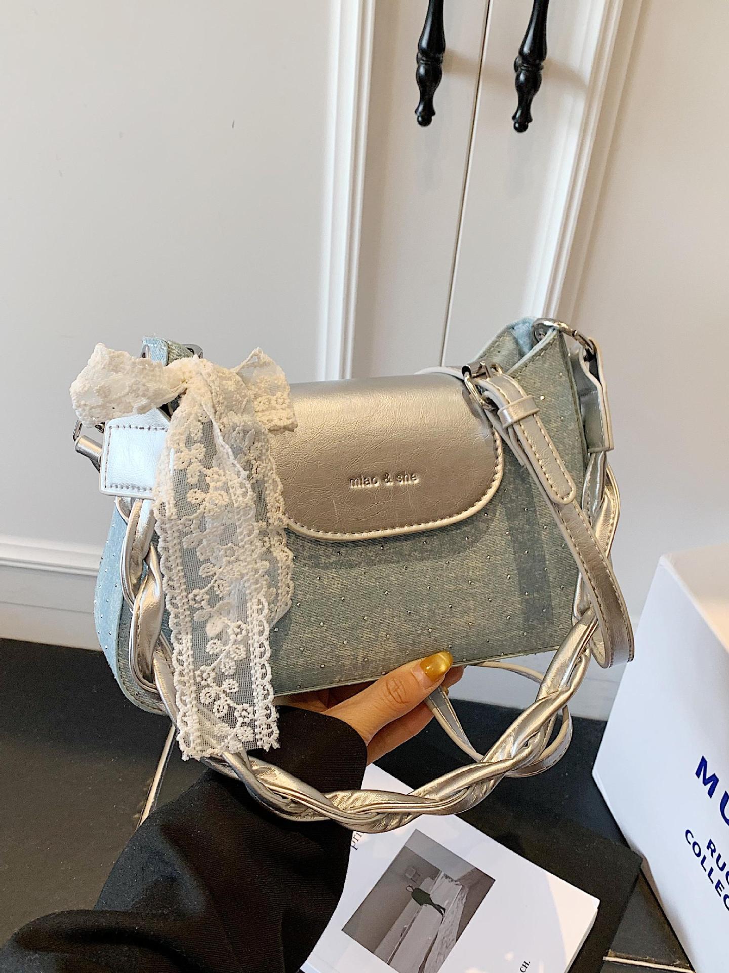 Bolso de moda coreano de estilo extranjero bolso de mano mujer 2025 verano nuevo bolso de brazo de denim bolso de viaje