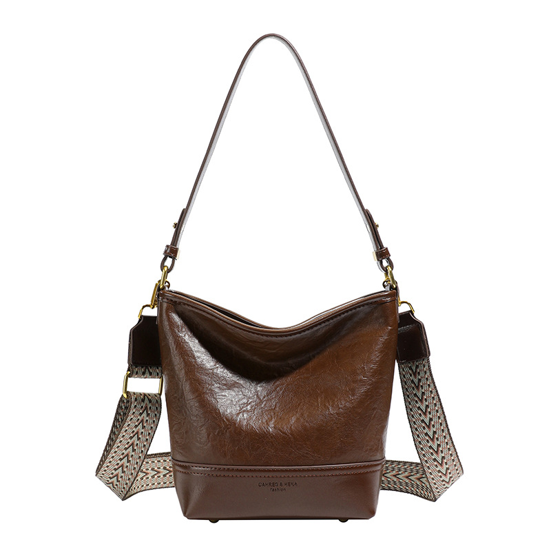 Cross-border 2025 invierno nuevo retro bolso de balde de mujer simple de gran capacidad bolso de hombro para viajar mochila