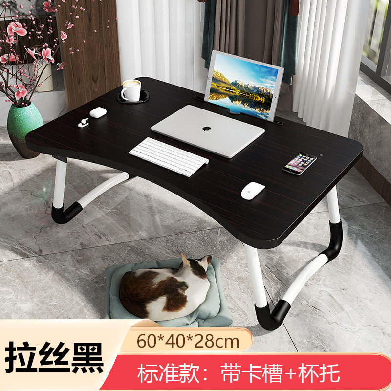 ノートパソコンの机の上で折り畳みます。|undefined