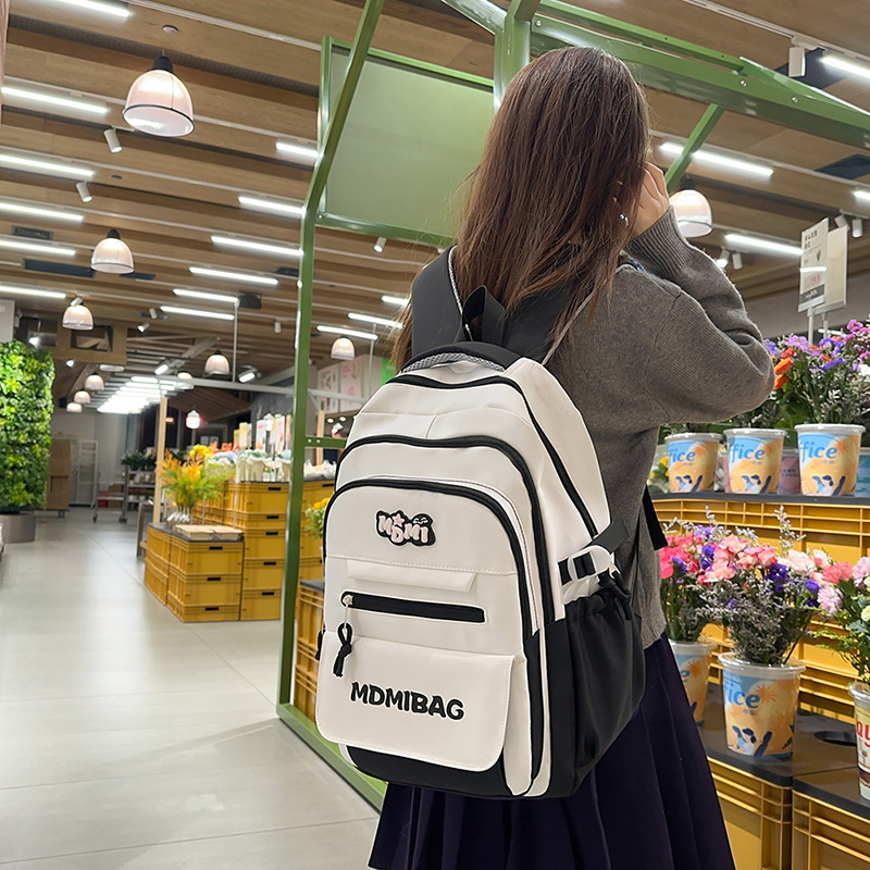 Mochilas escolares niñas de secundaria de alto valor facial nicho estilo insfeng estudiantes de secundaria de gran capacidad chocan con el color de los estudiantes de primaria para reducir la carga mochila