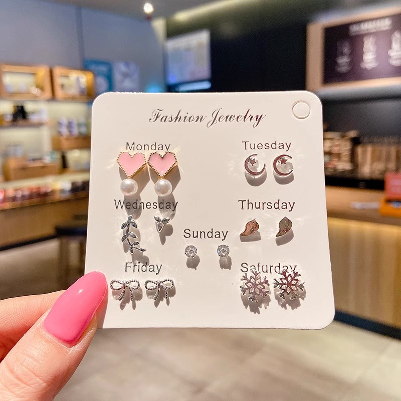 Juego de pendientes 2025 nuevas mujeres de moda simples, compactas, exquisitas, de alta gama, pendientes de celebridades de Internet