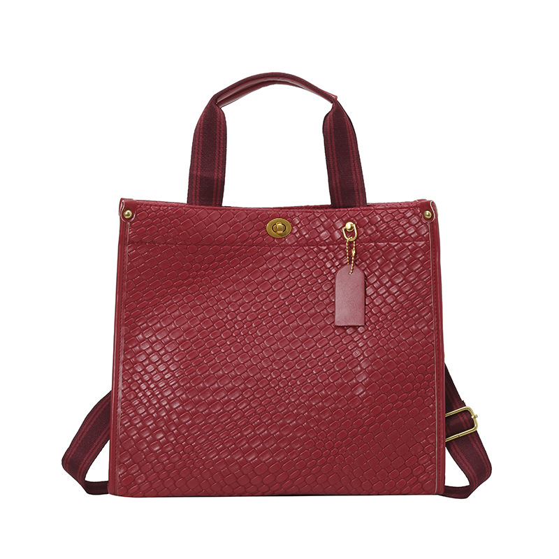Bolsa de mano de tejido de alta calidad para mujeres 2025 nueva moda transfronteriza de gran capacidad de transporte de hombro mochila