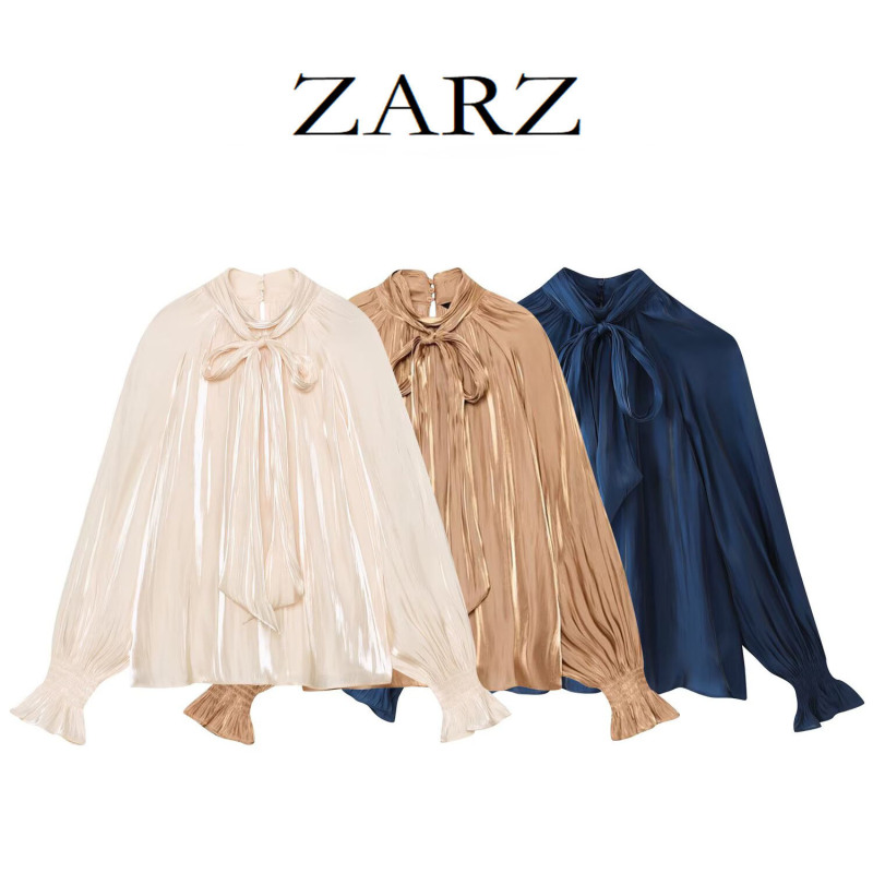 ZARZ, a European and American style brand, presents its new collection of women’s clothing: a silk satin blouse with a bow detail, style number 8741/252/756 ZARZ, a European and American style brand, presents its new collection of women’s clothing: a silk satin blouse with a bow detail, style number 8741/252/756