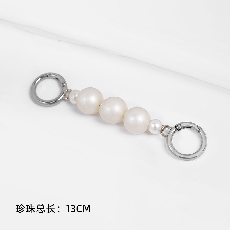 Silver and white pearl chain