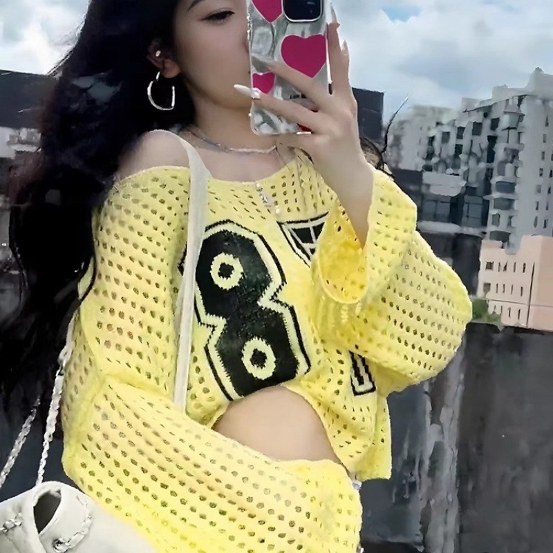 2025 verano chaqueta de mujer caliente hueco corto camisa de punto protector solar principios de otoño nuevo suéter blusa chaqueta de mujer