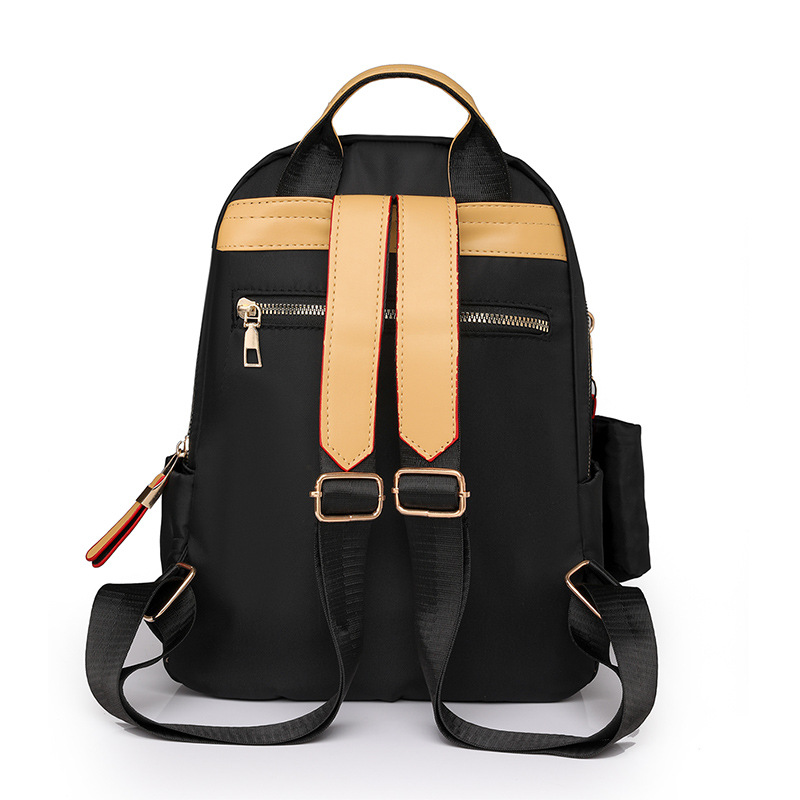 2024 nueva mochila de color de contraste para mujer de moda Lingge ocio de gran capacidad al aire libre mochila de viaje ligera al por mayor