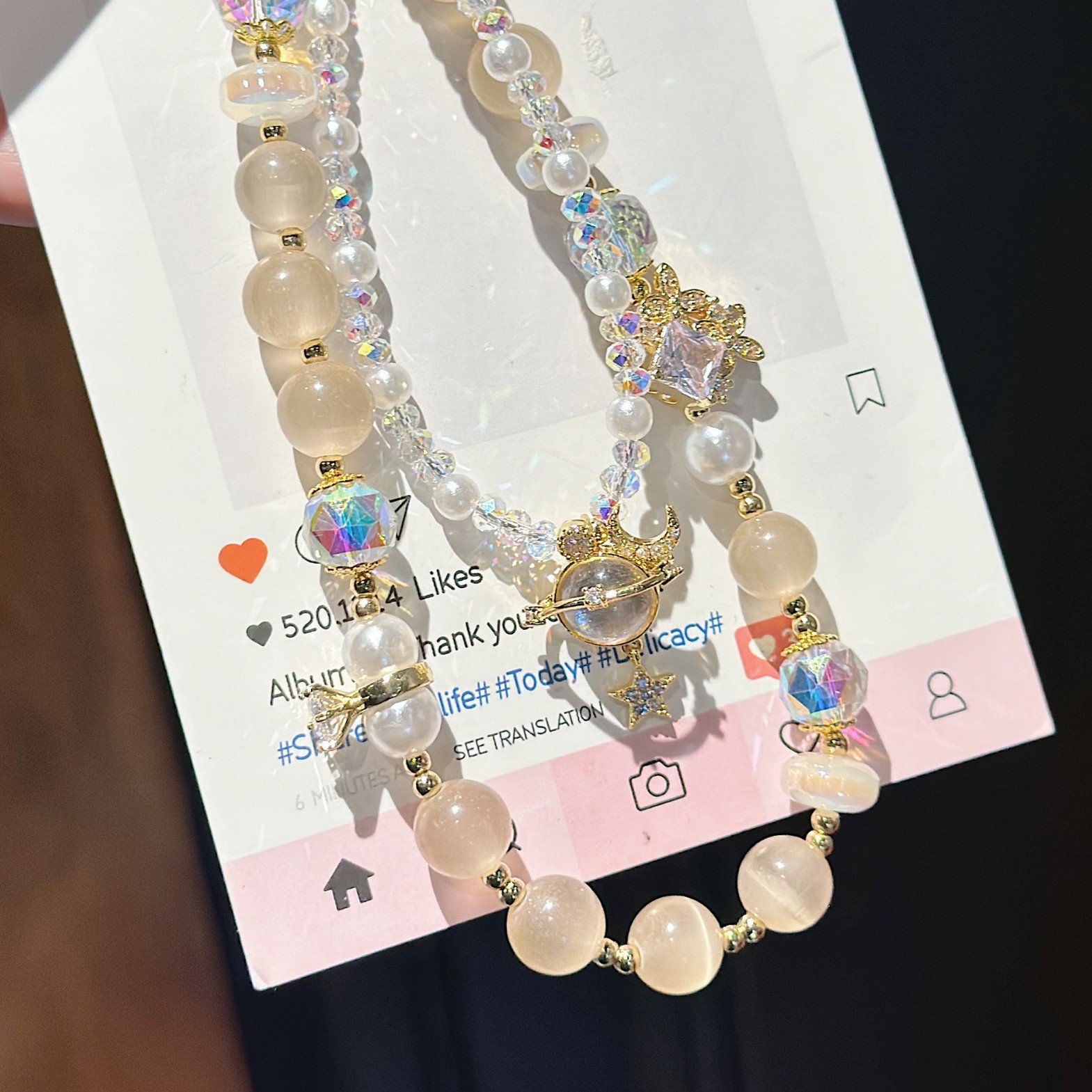 Boutique hecho a mano de alta gama para teléfono móvil cadena larga de vidrio de universo pequeño femenino cordón de teléfono móvil de moda colgante de mensajero largo