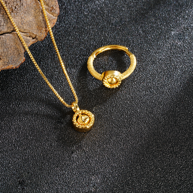 Nuevos productos de lujo ligero oro de cobre de oro anillo de ojo de gato giratorio collar accesorios al por mayor