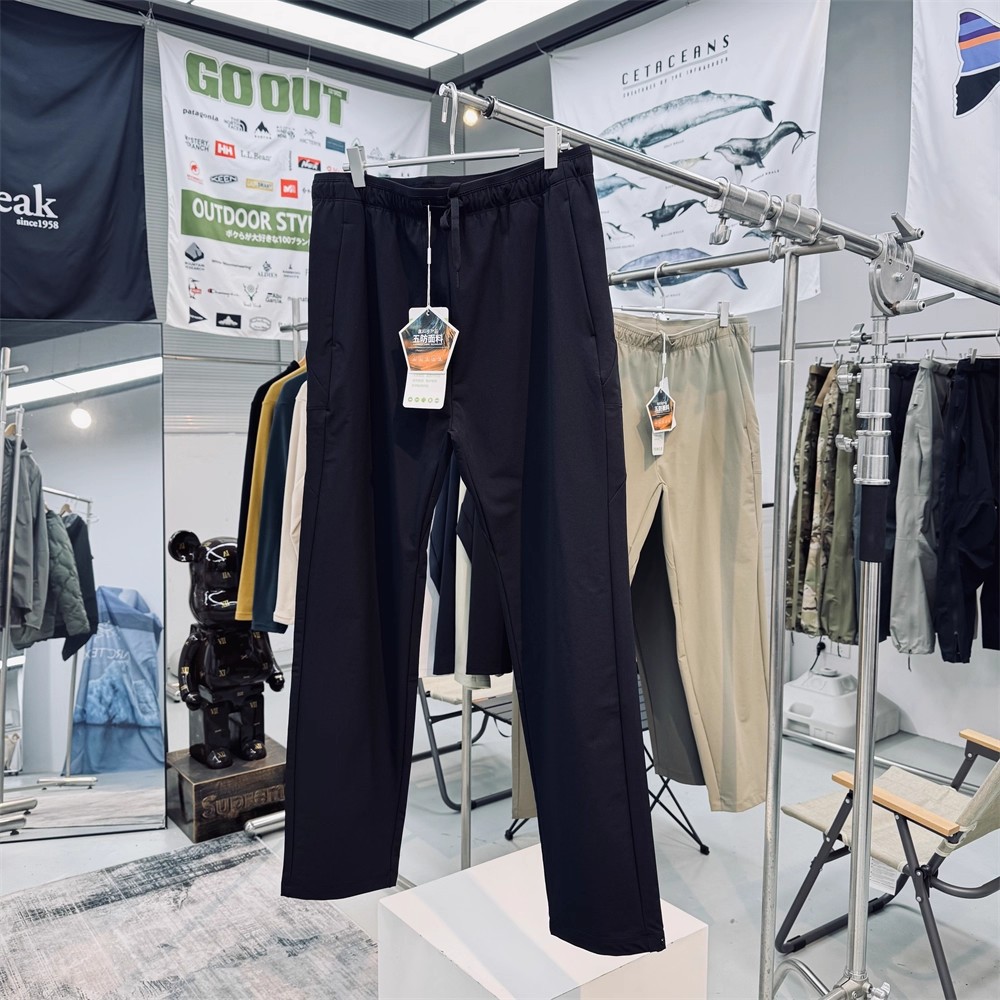 Pantalones al aire libre de cáscara blanda para hombres y mujeres pantalones de otoño impermeables al desgaste pantalones de montaña pantalones deportivos casuales