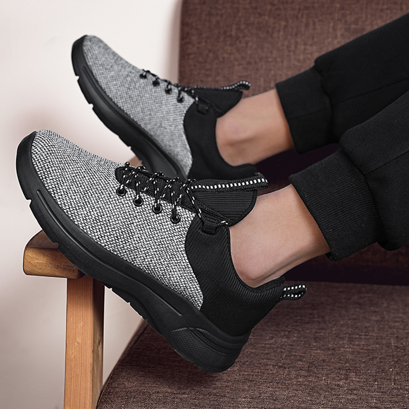 Zapatos transfronterizos de talla grande para hombre 2025 primavera y verano zapatos deportivos transpirables de malla negra tejida voladora zapatos para correr casuales de viaje para hombre