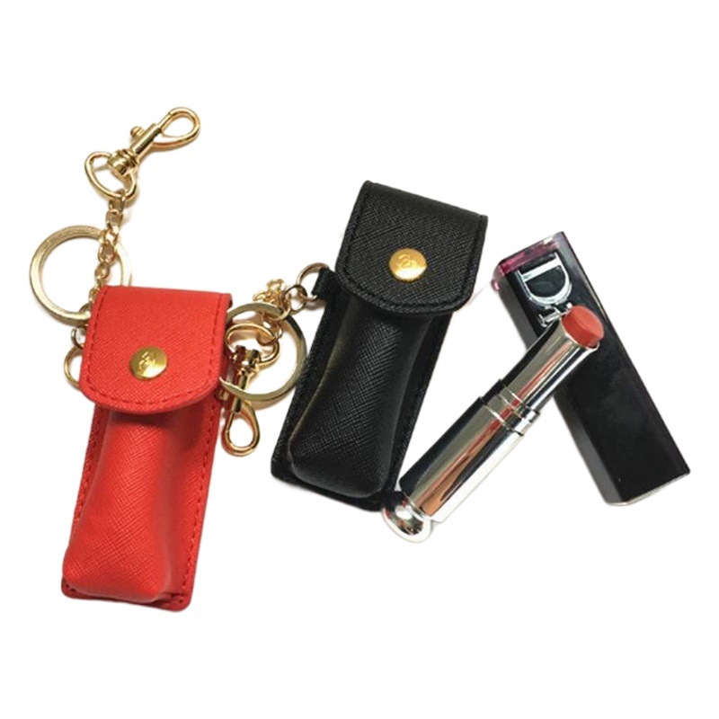 En stock lápiz labial caja de cuero lápiz labial portátil brillo de labios protección pequeña caja de cuero creativo llavero transfronterizo
