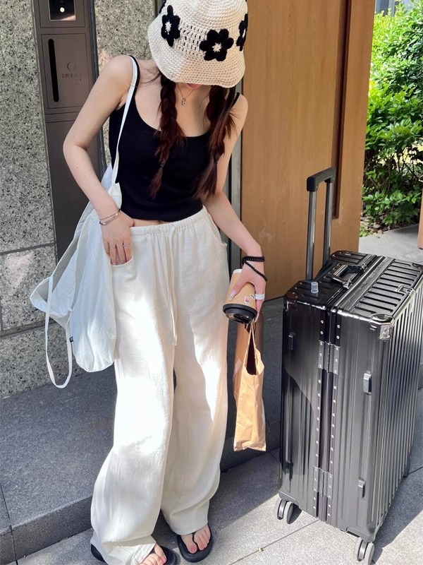 亜麻のワイドパンツの女性の夏の薄いタイプの高腰の垂れ下がった感がゆったりしていて、やせています。|undefined