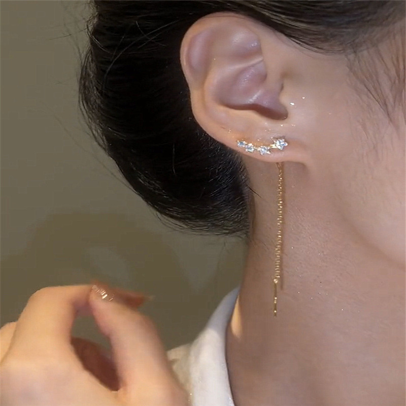 S925 aguja de plata de alta calidad estrella cadena borla oreja línea pendientes de las mujeres de lujo de la luz exquisita todo partido moda oído joyería
