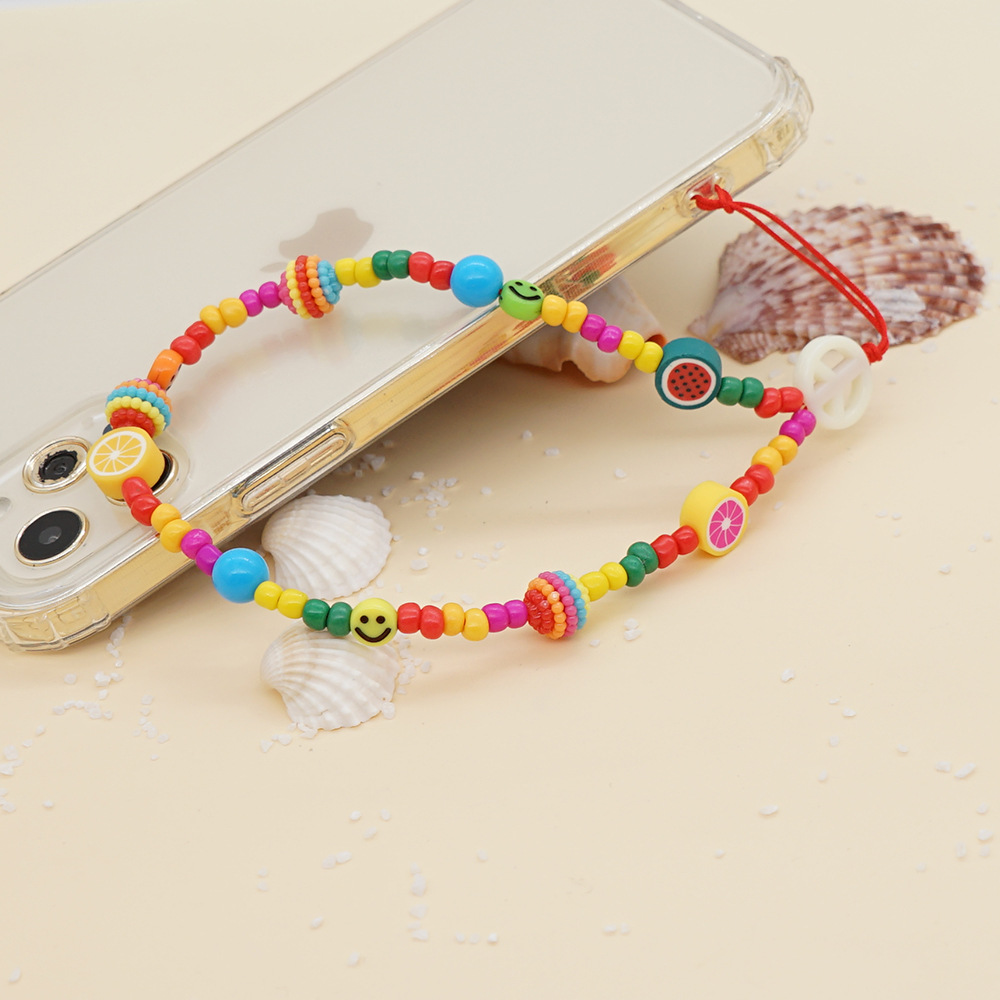 Nihaojewelry wholesale accessories acrylic colorful beads soft pottery fruit mobile phone chainpicture5