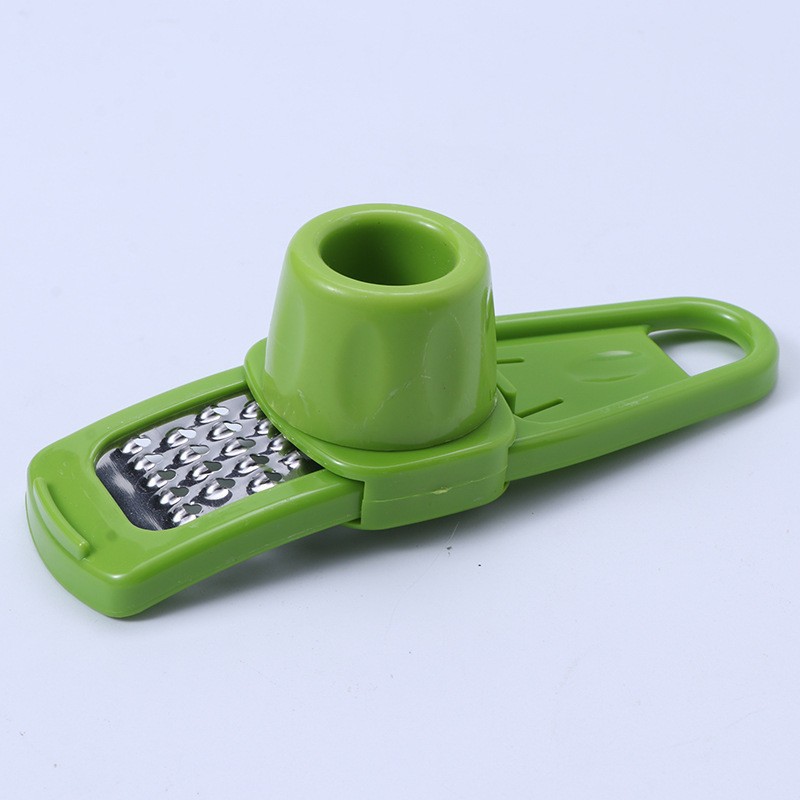 Fábrica al por mayor multi-función molinillo de ajo manual creativo prensa de ajo molinillo de ajo cocina gadget