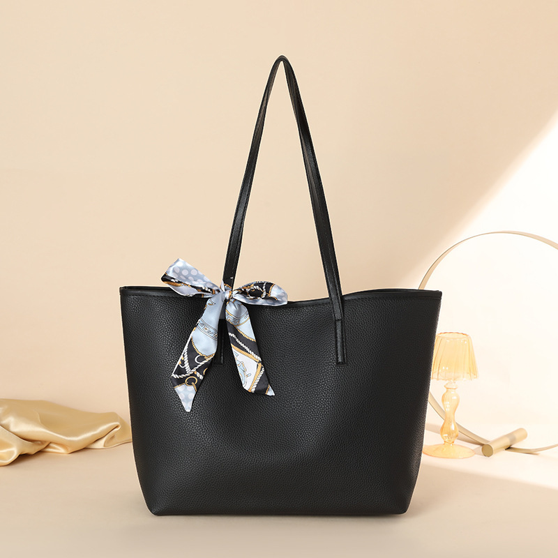 Bolsa de moda de comercio exterior simple y de gran capacidad 2024, nueva pañuelo de seda litchi decorado bolso de hombro de mujer de color sólido